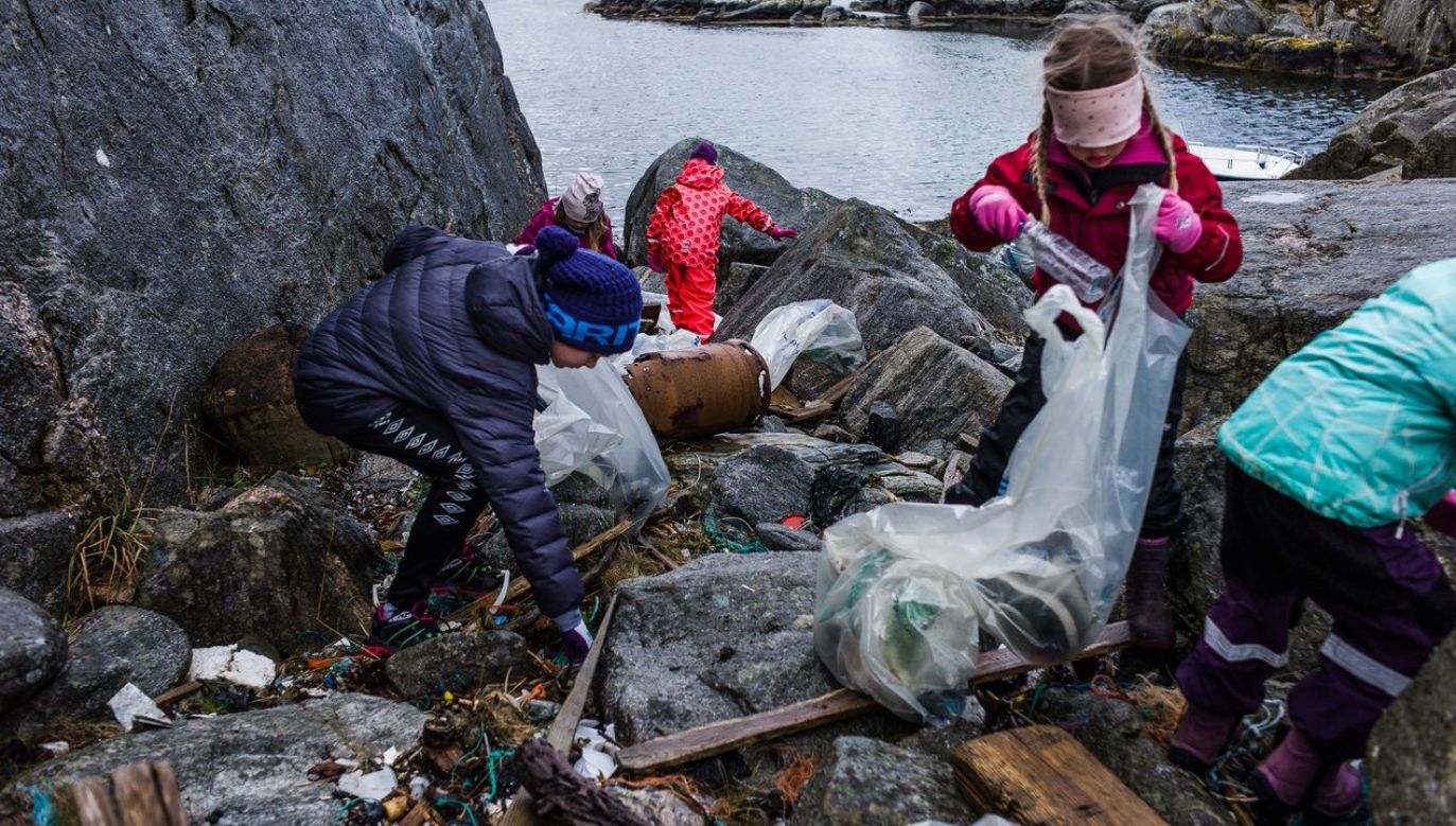 Children collect plastic off the coast of Norway. The cleaning action on Norwegian beaches was organized as part of the Plastic Whale Heritage program, to coomemorate the death of a rare baleen whale, that was beached in the waters of the island of Sotra with its stomach full of plastic. The shocking images went all around the world, and the Plastic Whale quickly became a global symbol for the fight against plastic pollution. Photo Daniel James Homewood / SOPA Images / LightRocket via Getty Images
