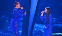 Natasza Urbańska i Michell Siwak w piosence „Runnin' (Lose It All)”, którą wykonują Naughty Boy, Beyoncé oraz Arrow Benjamin. Ubrane są w niebieskie spodnie i bluzki. Natasza ma na sobie jeszcze ogon z piór.