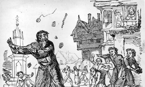 Około 1600 r. Młodzież kamienuje Żydów na ulicy podczas Wielkiego Postu; starszy mężczyzna ucieka przed gradem kamieni na placu miejskim. Fot. Hulton Archive / Getty Images